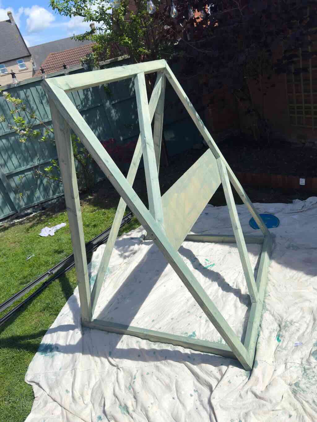 Basic timber frame after first coat of paint